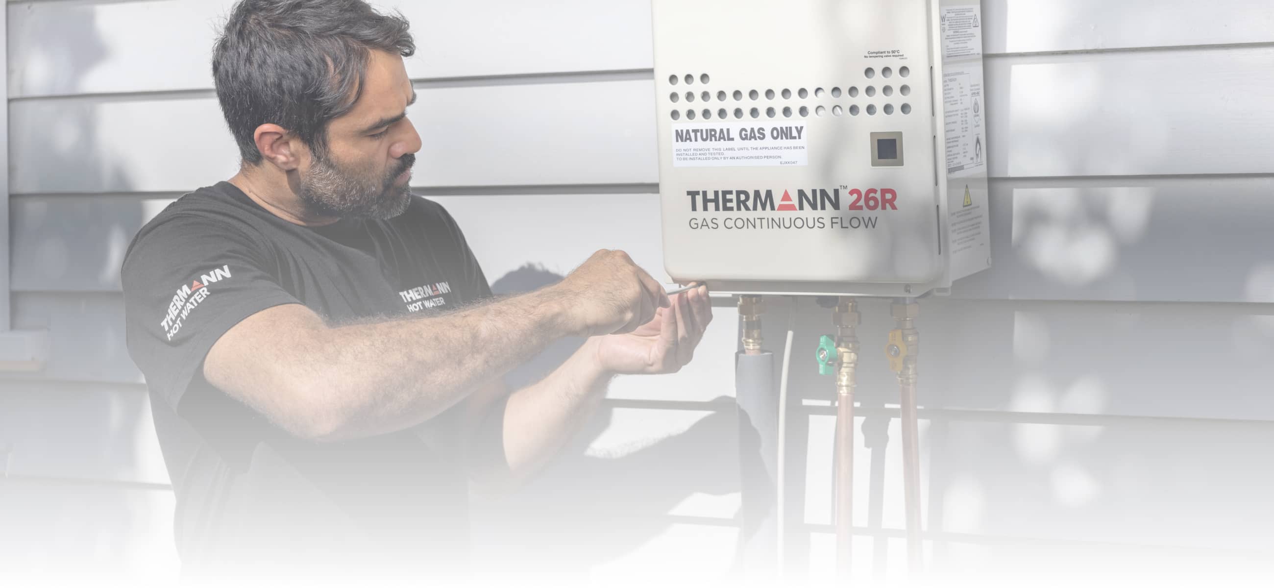 Thermann plumber installing a Thermann Hot Water System